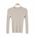 Meisje beige geribde trui