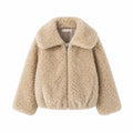 Zachte teddy jas beige