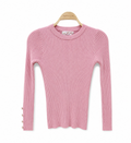 Meisje roze geribde trui